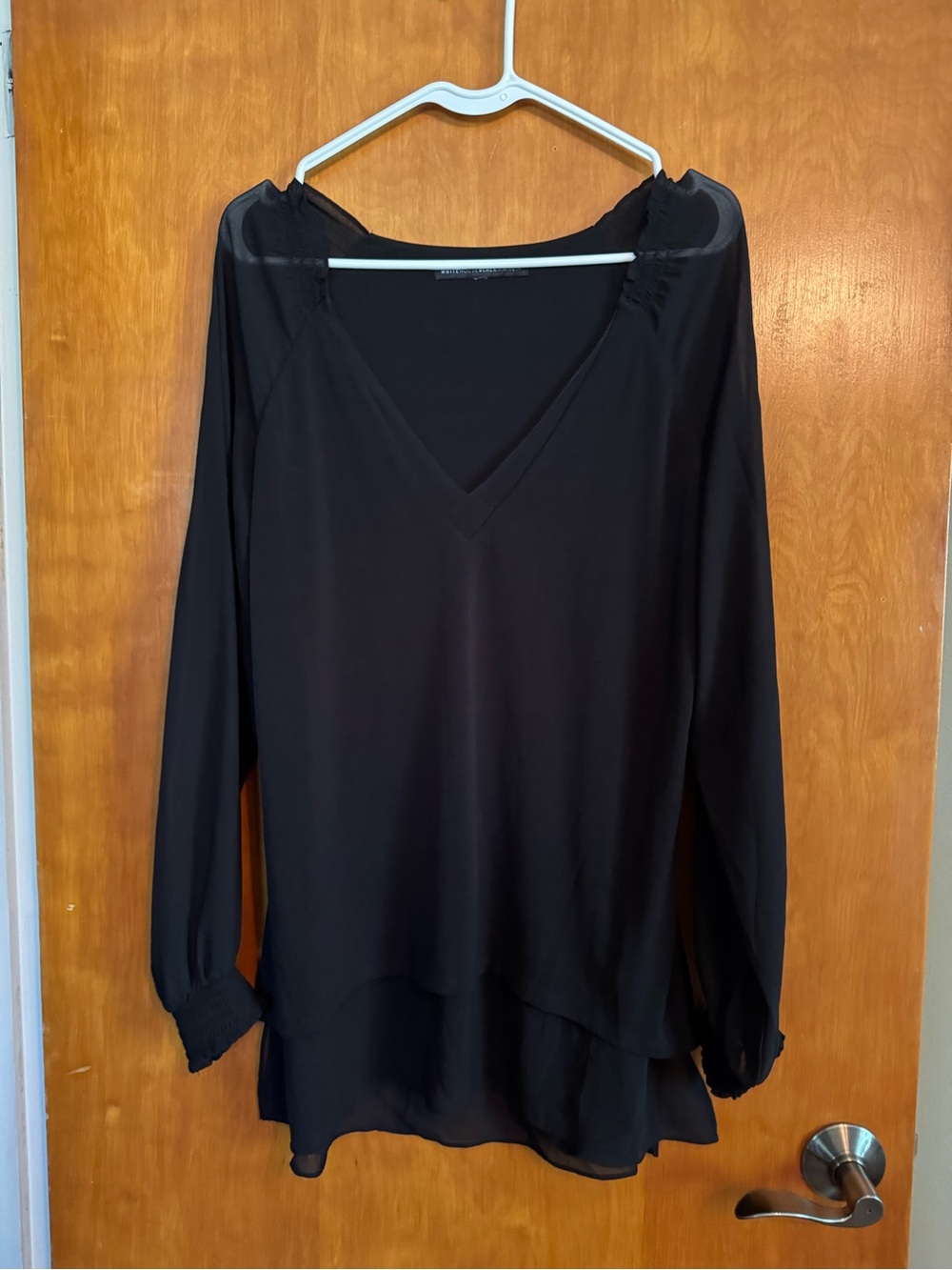 White House Black Market Black V-Neck Blouse with Layered Hem Sheer Long Sleeves